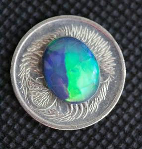 BLACK OPAL Green Blues Broad pattern flash 2.72cts Oval shape from Lightning Ridge