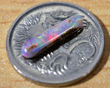 Australian pipe opal with the colours of the rainbow from Cloud Publishing