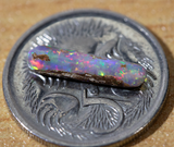 Australian pipe opal with the colours of the rainbow from Cloud Publishing