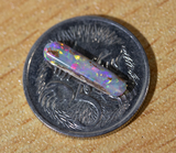 Australian pipe opal with the colours of the rainbow from Cloud Publishing