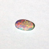Lightning Ridge Crystal Opal red green blue 0.74ct cabochon oval gemstone from Australia