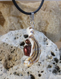 Freshwater pearl, sterling silver beads and a shell fragment make this one of a kind pendant necklace