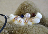 Freshwater pearls and shell sterling silver pendant necklace from Cloud Publishing