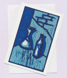 Greeting card lino print of a couple of blue bottles by artist Jon Howarth and Cloud Publishing