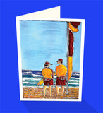 Surf life savers on patrol swim standing between the flags. An iconic greeting card from Cloud Publishing