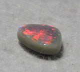 Red Australian opal on grey potch from Cloud Publishing