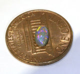 red green blue dark Australian opal gemstone from Cloud Publishing
